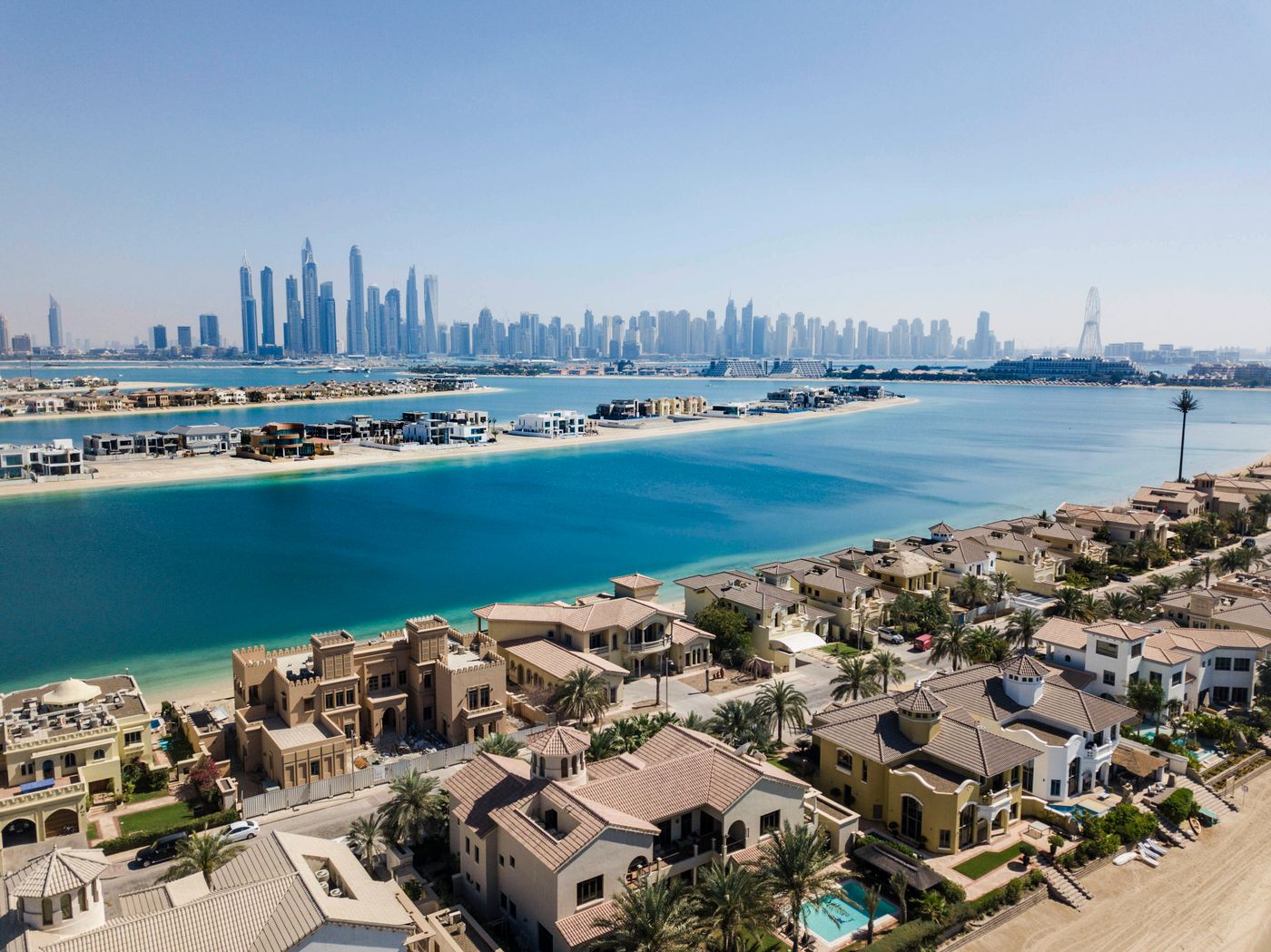 Villa communities with the Dubai skyline behind